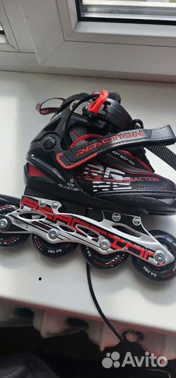 Роликовые коньки