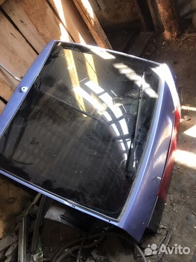 На ваз 2112 крышка багажника