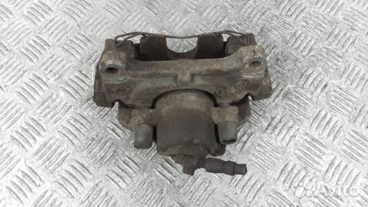 Суппорт тормозной передний левый volkswagen passat