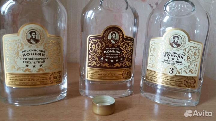 Пустые стеклоизделия из под коньячных напитков