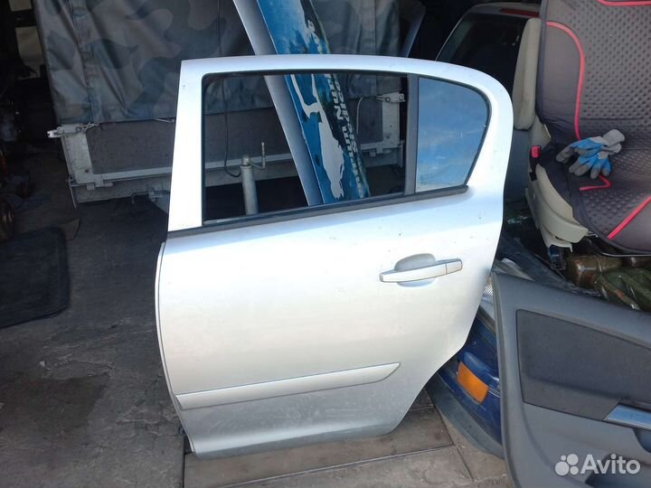 Opel Corsa D амортизаторы крышки багажника крышка