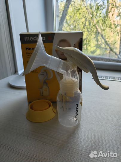Молокоотсос medela ручной