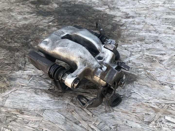 Суппорт задний левый для Opel Astra H