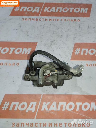 Суппорт тормозной передний левый Suzuki SX4 2006