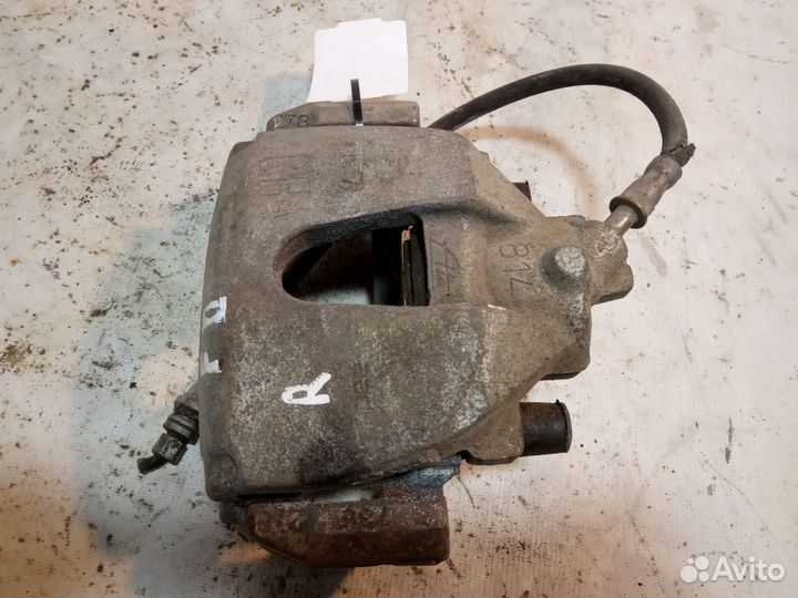 Суппорт тормозной передний правый Mazda 3 BK