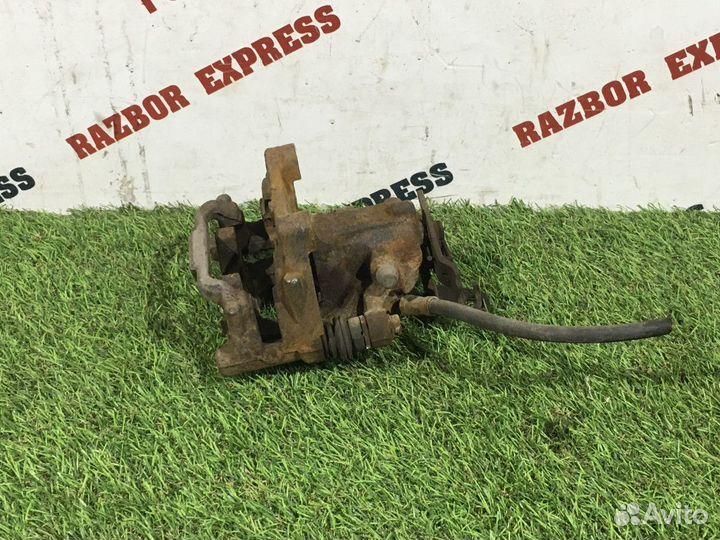 Суппорт тормозной задний правый Skoda Octavia A5