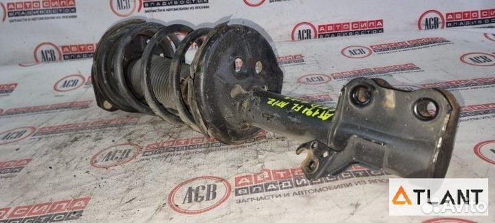 Стойка передняя левая toyota carina