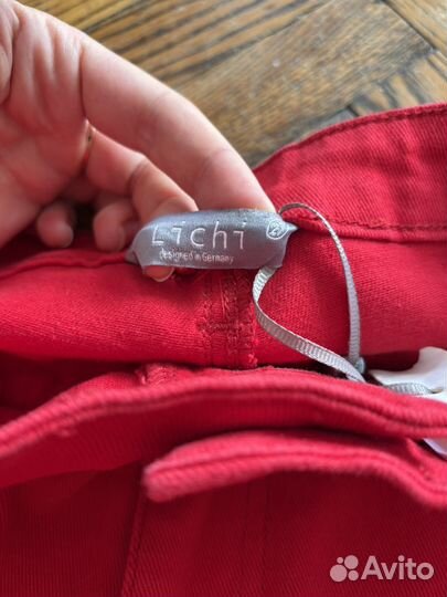 Брюки Lichi с перьями