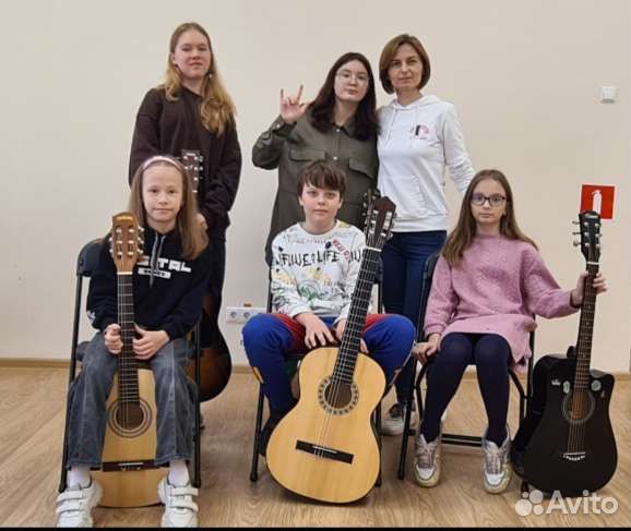 Учитель гитары