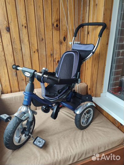 Трехколесный велосипед с ручкой capella