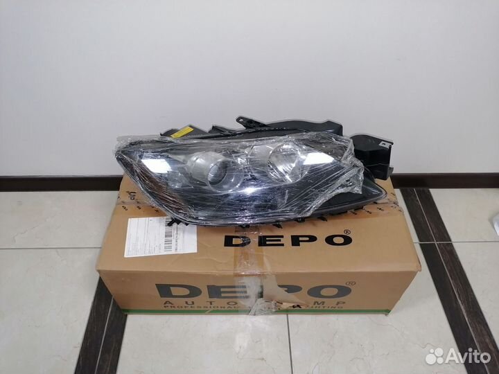 Фара Mazda сх7