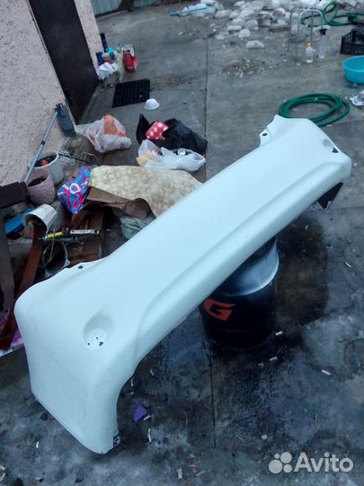 Задний бампер на Тойоту Королла Е 150