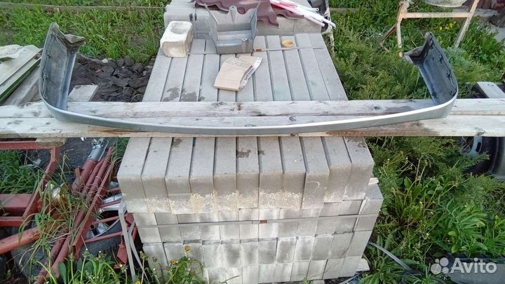 Митсубиси ланцер 9 юбка заднего бампера