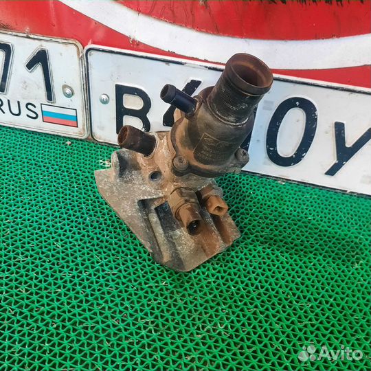 Корпус термостата renault megane 1