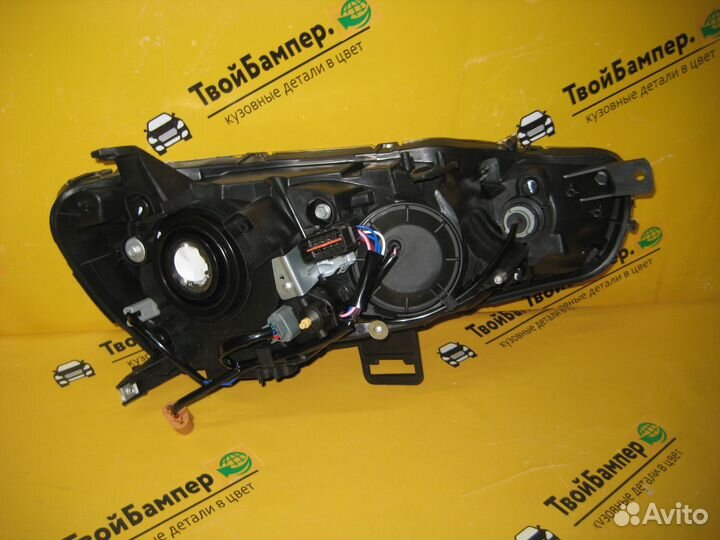 Фара левая Mitsubishi Lancer 10 под эл кор