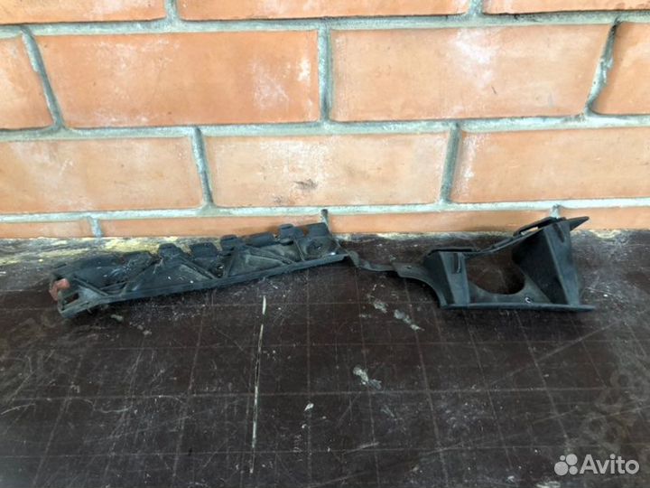 Кронштейн бампера задний левый Opel Astra J