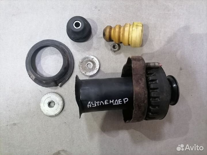 Опорник заднего амортизатора Mitsubishi Outlander