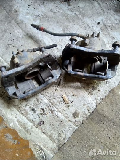 Передний суппорт Мицубиси Каризма