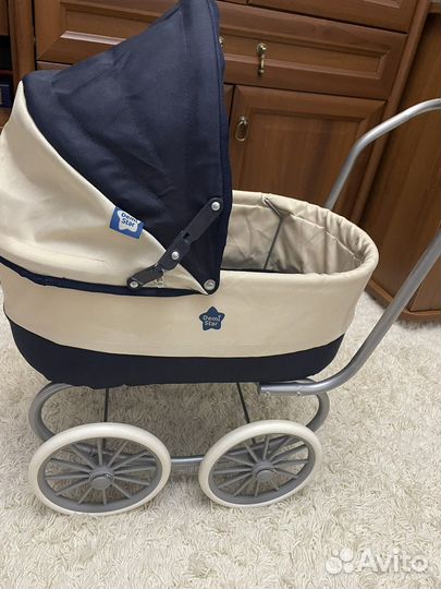 Игрушечная коляска для кукол