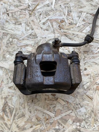 Суппорт передний левый Chevrolet Aveo T250 Разбор