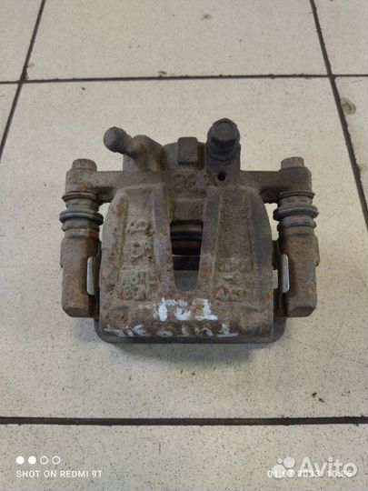 Суппорт тормозной задний левый Chery Tiggo 5 T21