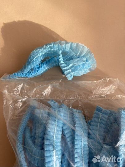 Шапочки одноразовые