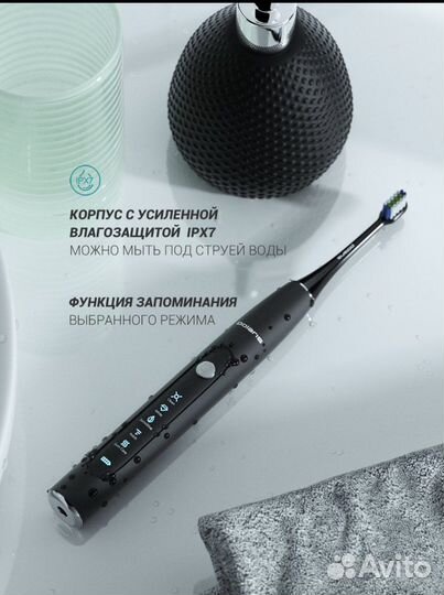 Электрическая зубная щетка