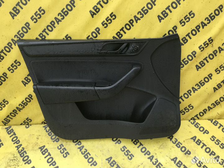 Обшивка двери передней левой Skoda Rapid