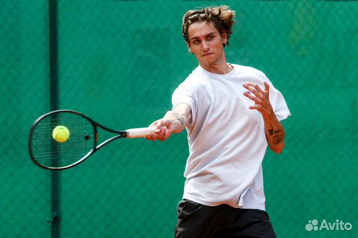 Тренер по большому теннису