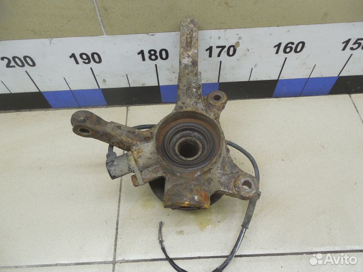 Кулак поворотный передний левый Micra (K11E) 1992