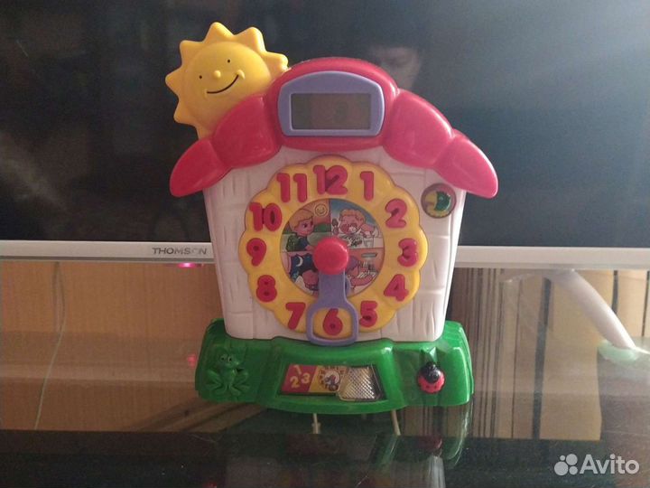 Занимательная игрушка часы