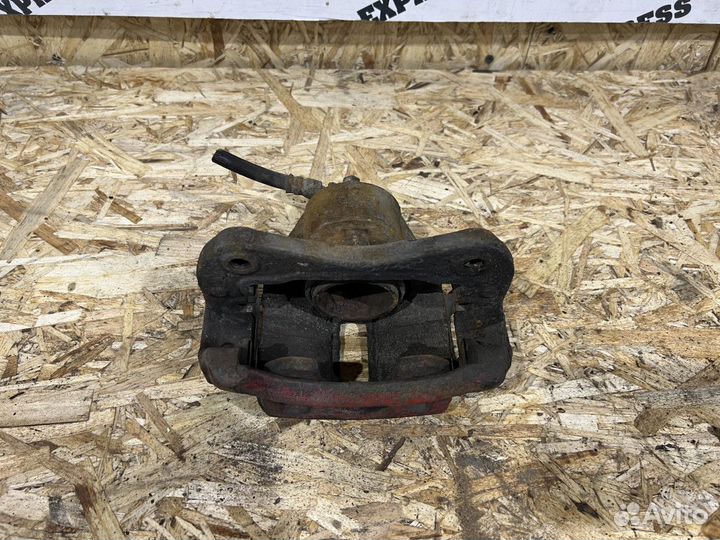 Суппорт тормозной перед левый Hyundai Elantra XD