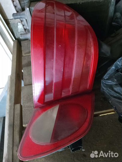 Коплект задних фонарей Мерседес 210