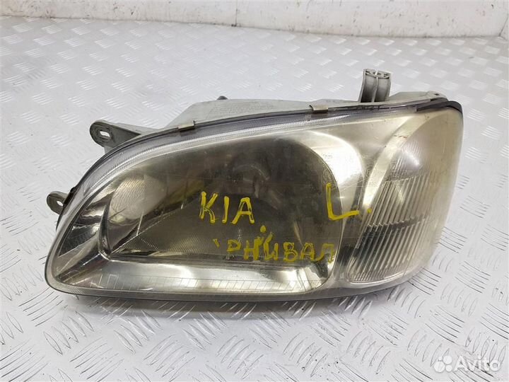 Фара левая Kia Carnival