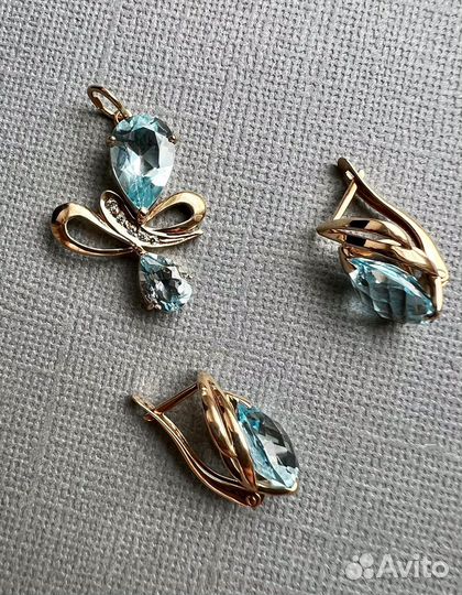 Золотые серьги и кулон с топазами