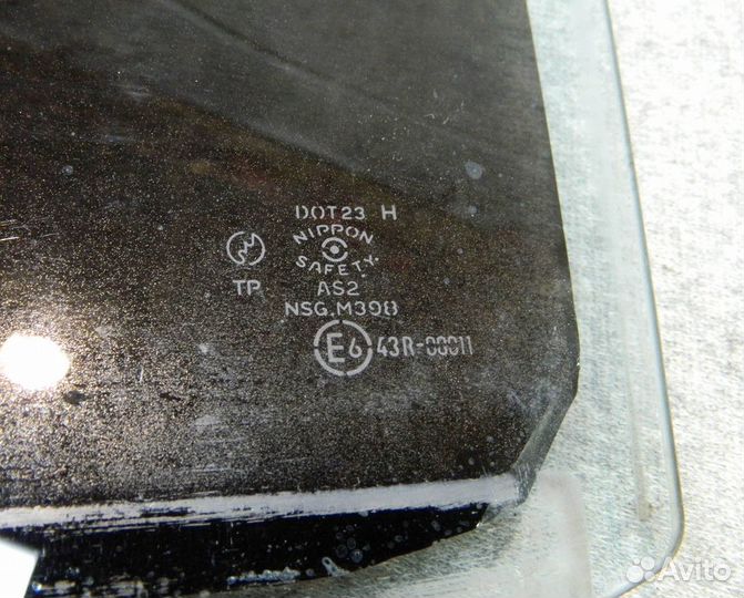 Стекло двери задней левой Mazda 626 GE