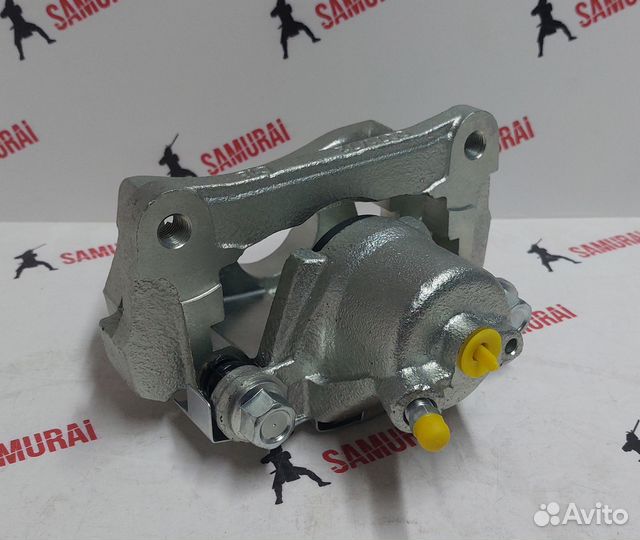 Суппорт тормозной зад Toyota land Cruiser 200