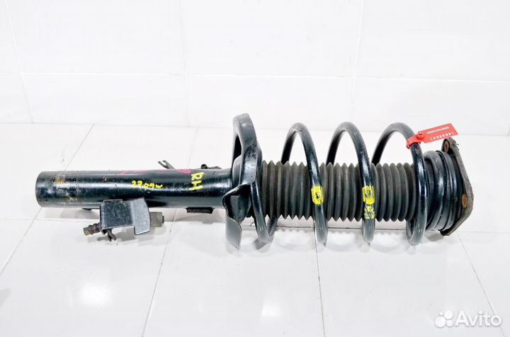 Стойка амортизатора передняя правая Mazda Mazda3