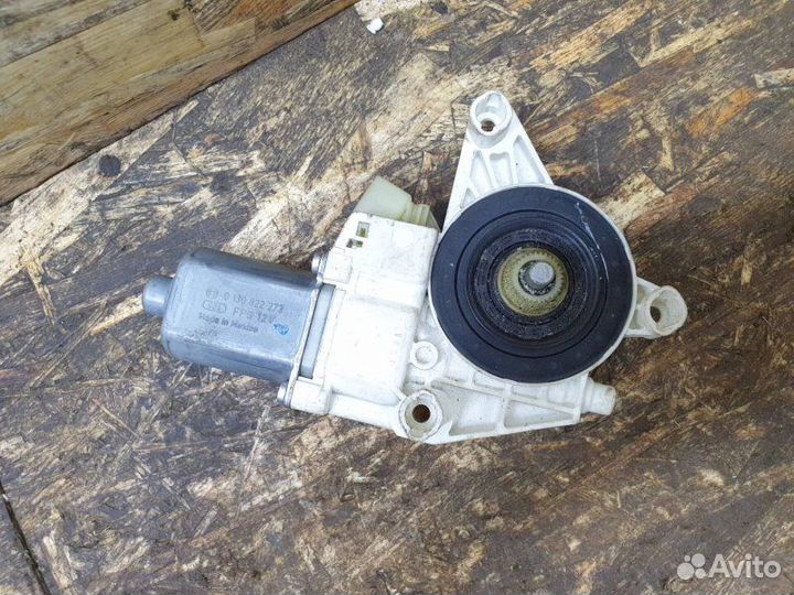 Моторчик стеклоподъемника передний левый