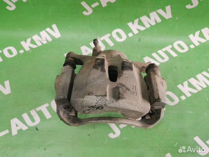 Суппорт передний правый Toyota Corolla E140