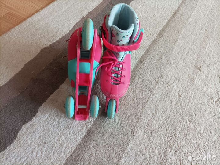 Роликовые коньки