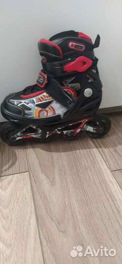 Роликовые коньки