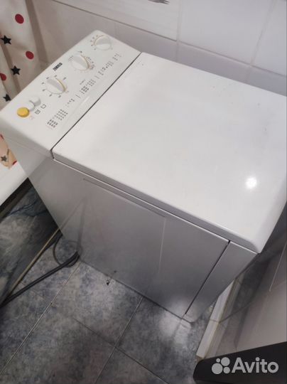 Стиральная машина с вертикальной загрузкой