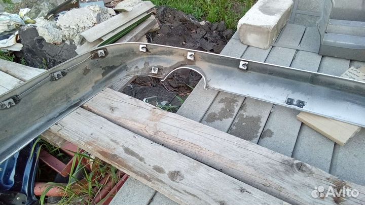 Митсубиси ланцер 9 юбка заднего бампера