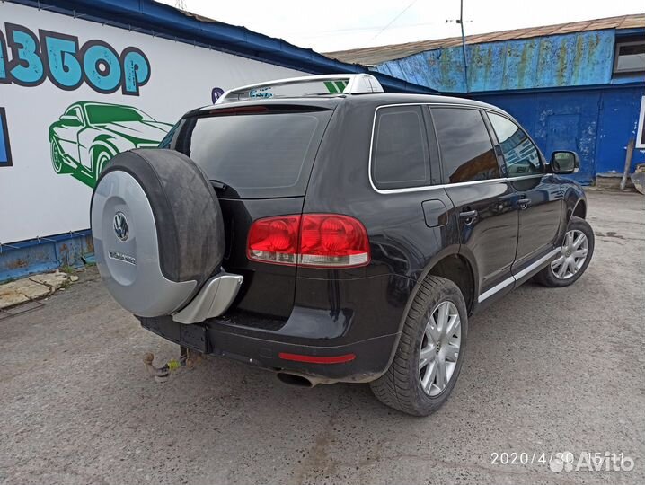 Натяжитель ремня Volkswagen Touareg 2004 077109479