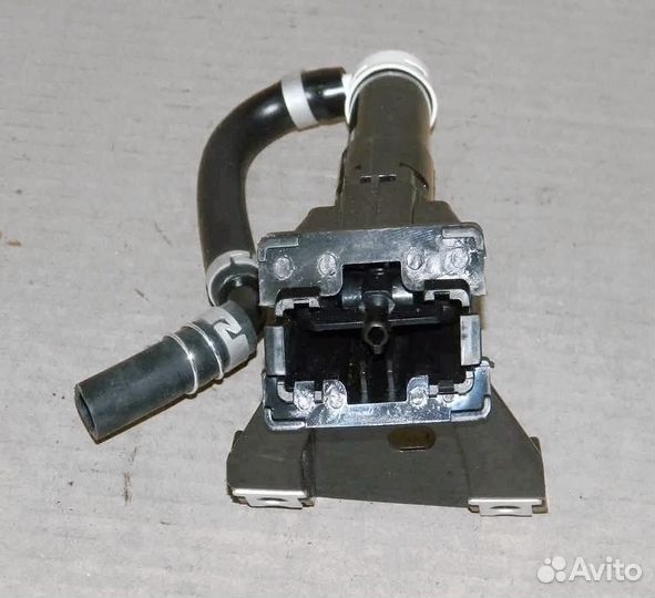 Форсунка омывателя фары Mitsubishi Outlander XL