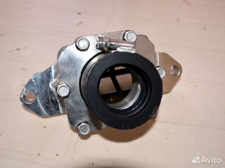 Лепестковый клапан на снегоход Буран