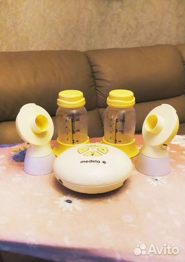 Молокоотсос двойной medela swing maxi flex