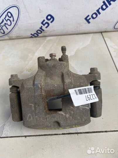 Суппорт передний левый Mitsubishi Lancer 10 CY