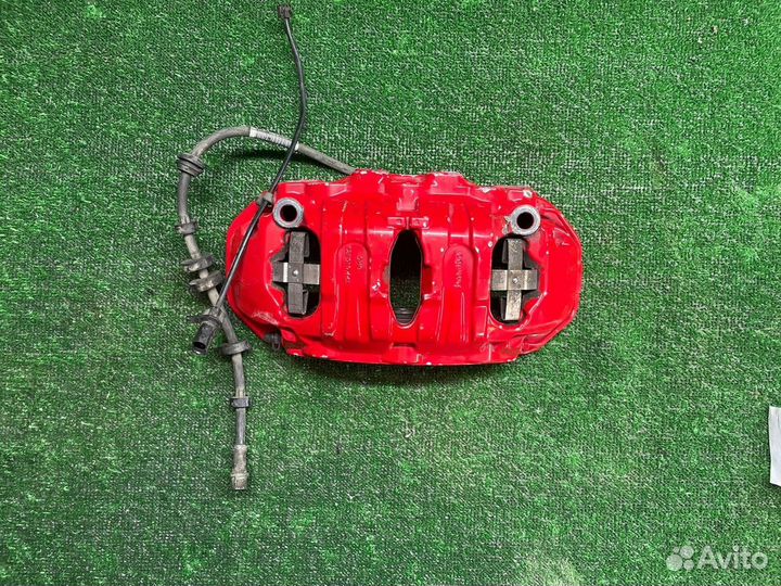 Суппорт передний левый Porsche Macan